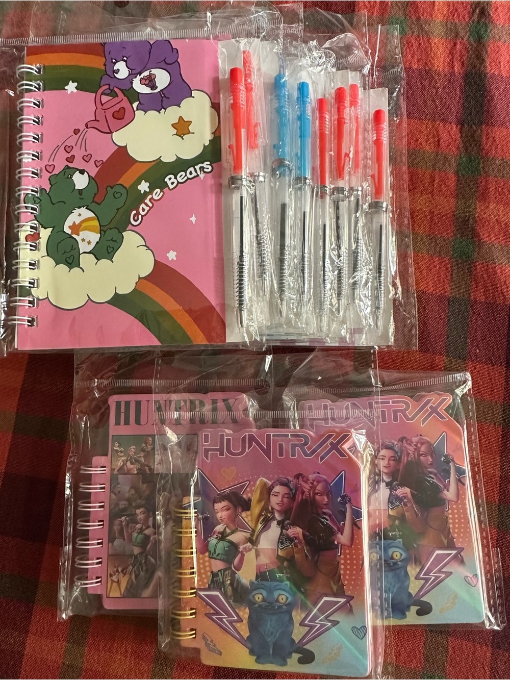 Care Bears and Huntryx spiral-bound notebooks